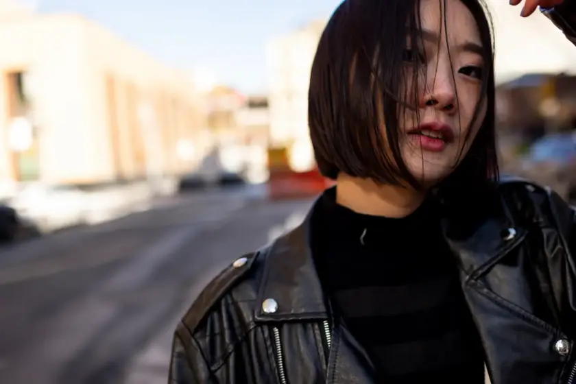 Confident Japanese woman in urban setting representing the Japan women sex toys market