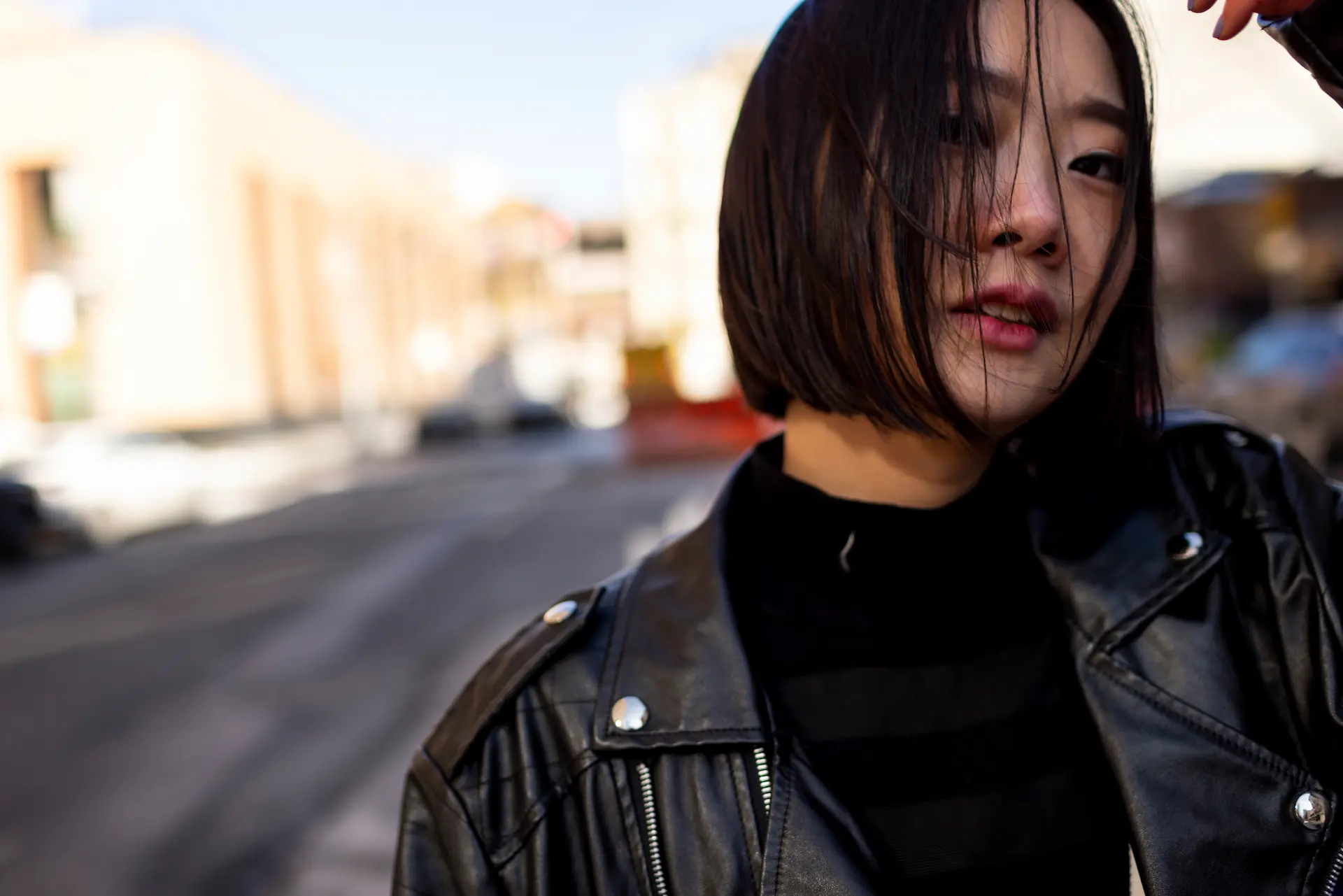 Confident Japanese woman in urban setting representing the Japan women sex toys market