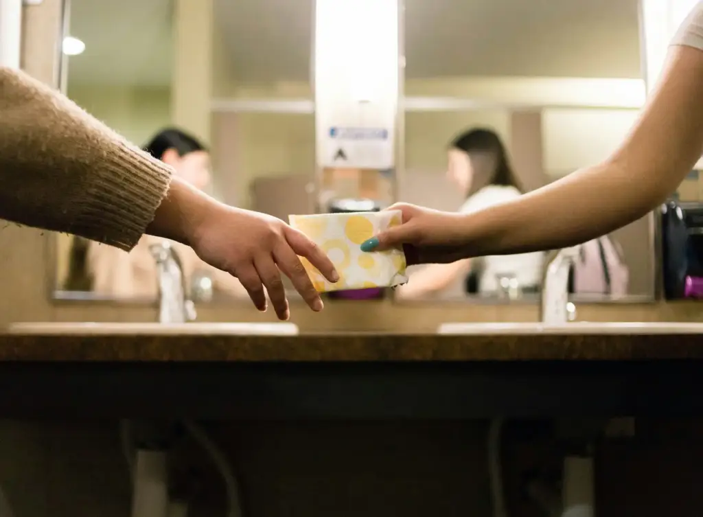 Hands exchanging a discreet package