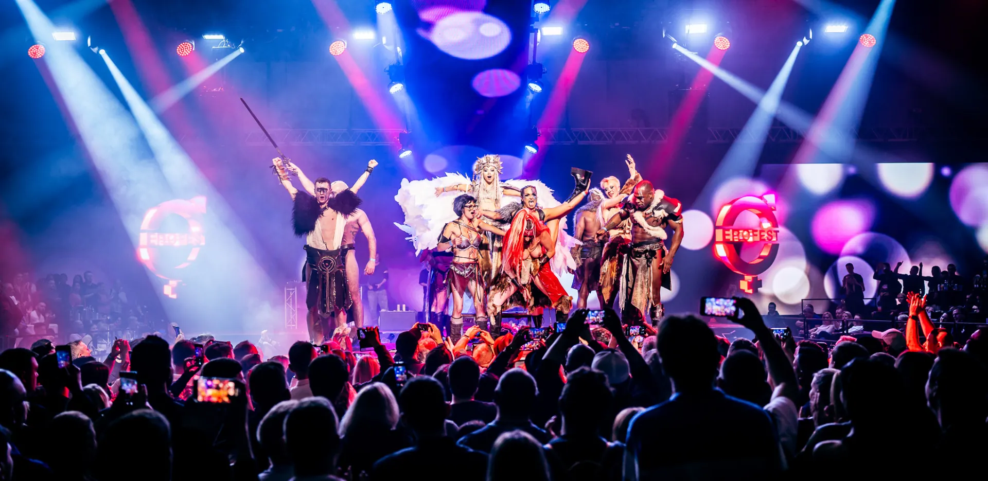 A dynamic stage performance at Erofest featuring costumed artists in an electrifying display of passion and creativity. Gaia in Love embraces the art of sensual entertainment in a spectacular showcase of empowerment and intimacy.