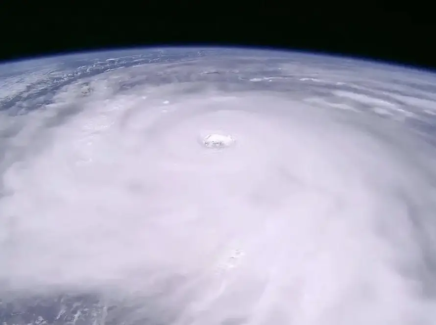 Satellite view of Typhoon Ragasa 2025 forming over the ocean, showing the eye of the storm and spiral cloud bands.