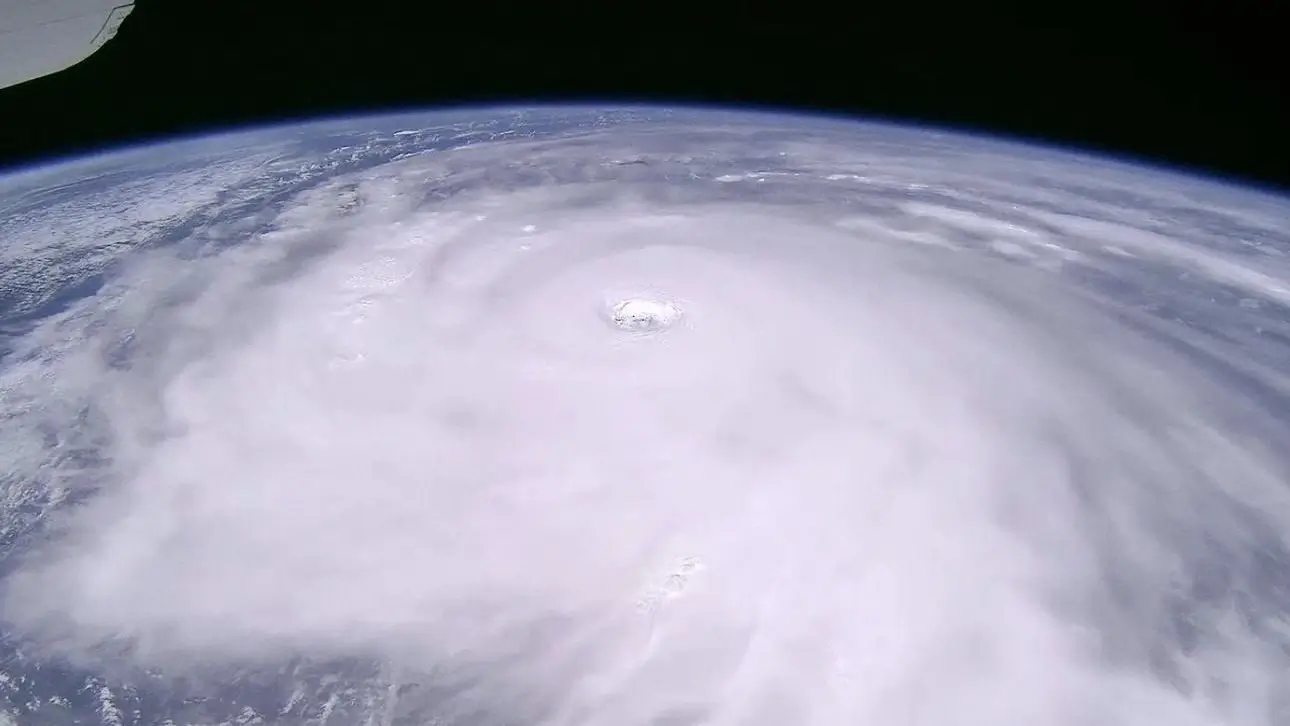 Satellite view of Typhoon Ragasa 2025 forming over the ocean, showing the eye of the storm and spiral cloud bands.