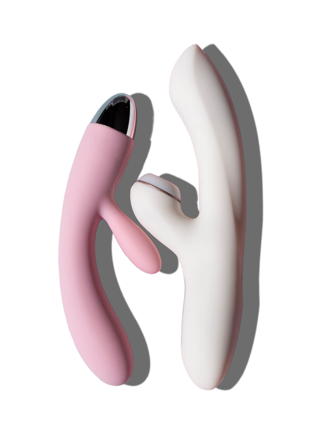 Two rabbit vibrators in pink and white with dual stimulation design