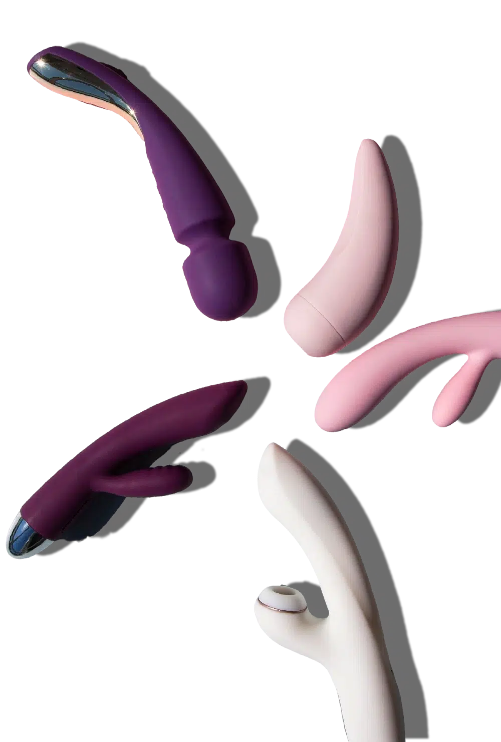 Assorted vibrator styles in pink, purple, and white on a dark background